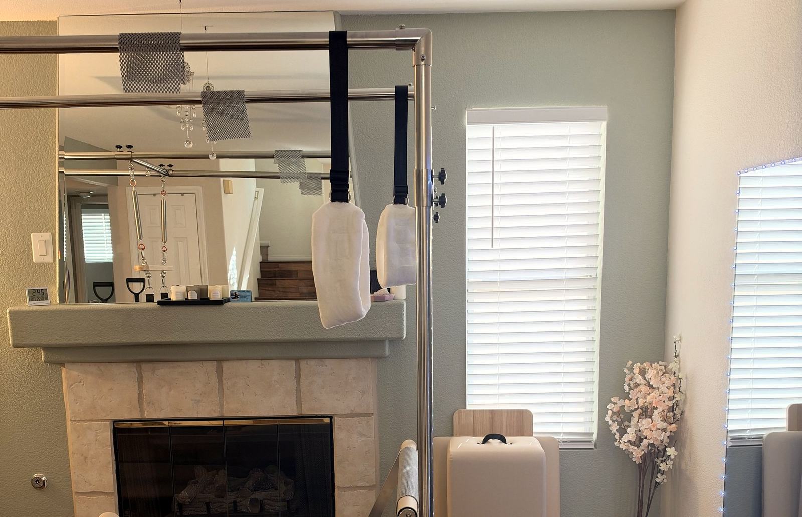 The Reformer beside the window and fireplace in Eve's studio